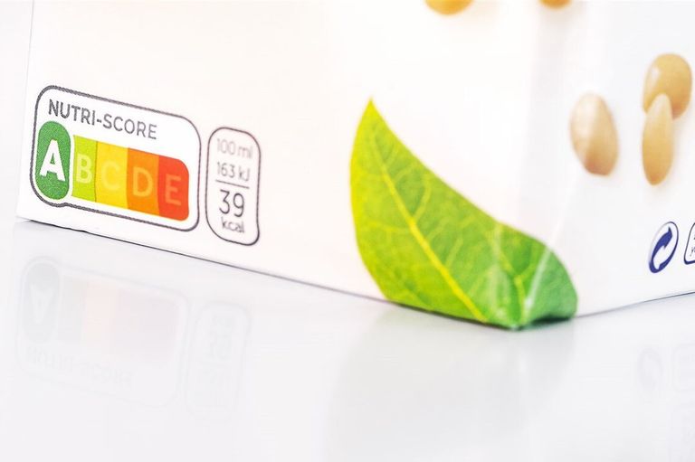 Nutri-Score op een product. Het logo bestaat uit 5 cijfers en 5 verschillende kleuren. A en groen zijn de gezondste keuzes en E en rood de ongezondste. Foto: ANP