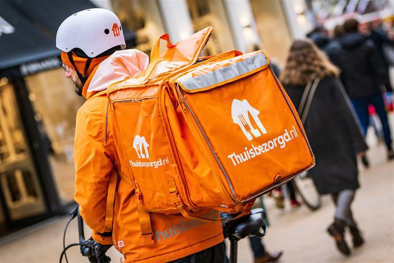 Just Eat Takeaway, het moederbedrijf van Thuisbezorgd.nl, heeft het verlies in de tweede helft van 2022 weggepoetst. - Foto: ANP