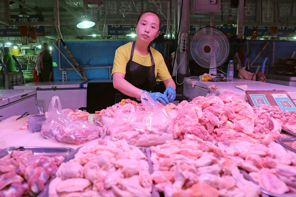 Verkoop van kippenvlees in China. - Foto: ANP - Foto: ANP