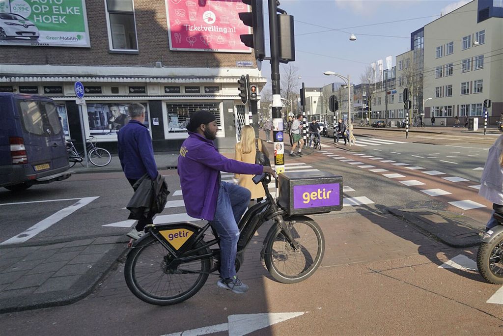In Amsterdam is flitsbezorger Getir verwikkeld in een juridische strijd met de gemeenteraad. -  Foto: ANP