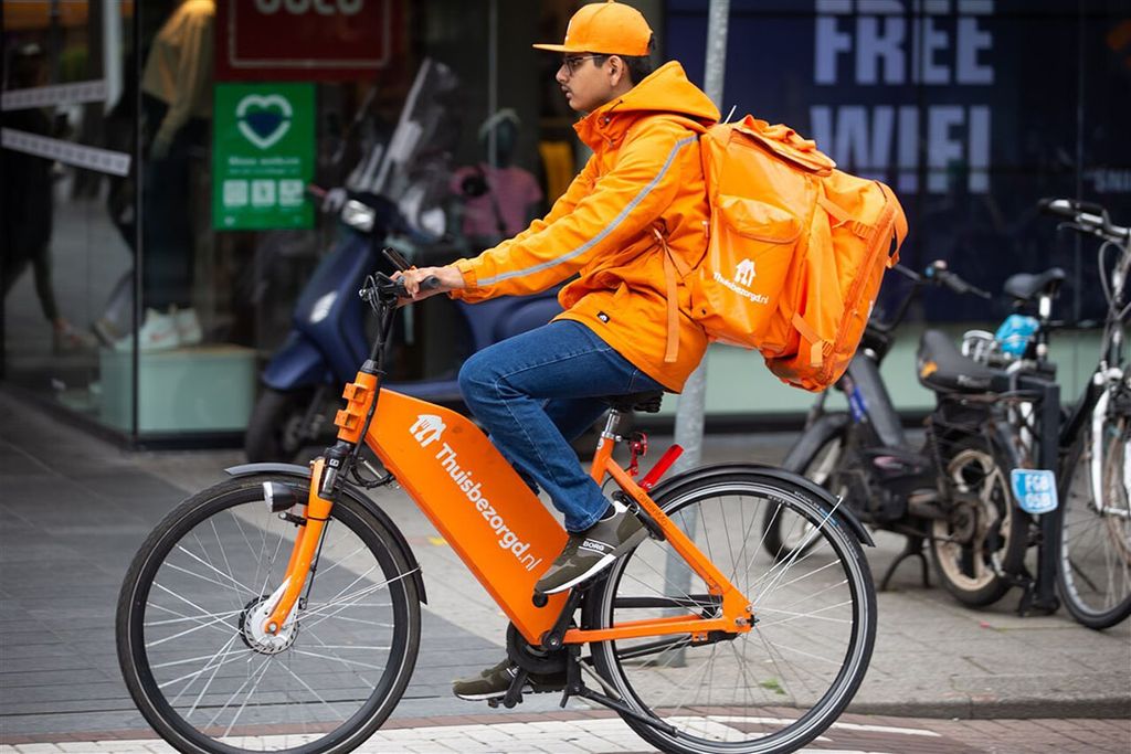 Het Brits-Nederlandse Just Eat Takeaway is het moederbedrijf van Thuisbezorgd.nl. - Foto: ANP/Hollandse Hoogte