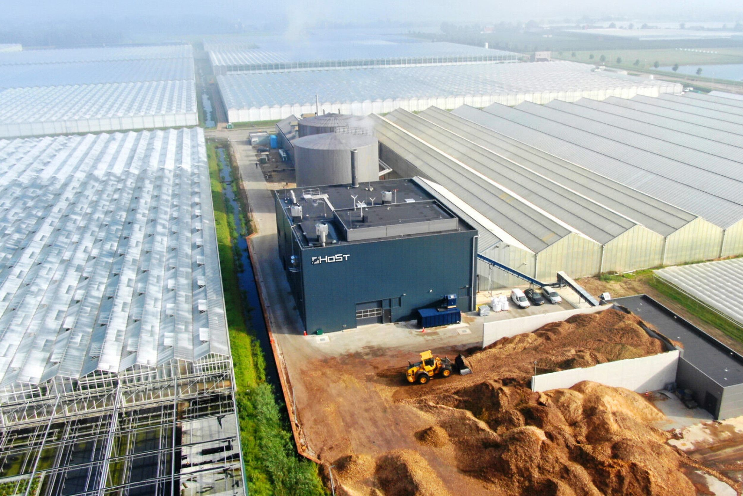 De biomassacentrale van Host levert warmte aan zestien bedrijven, maar kan nog veel meer warmte leveren aan bedrijven bij een uitgebreid warmtenet. Foto: Host