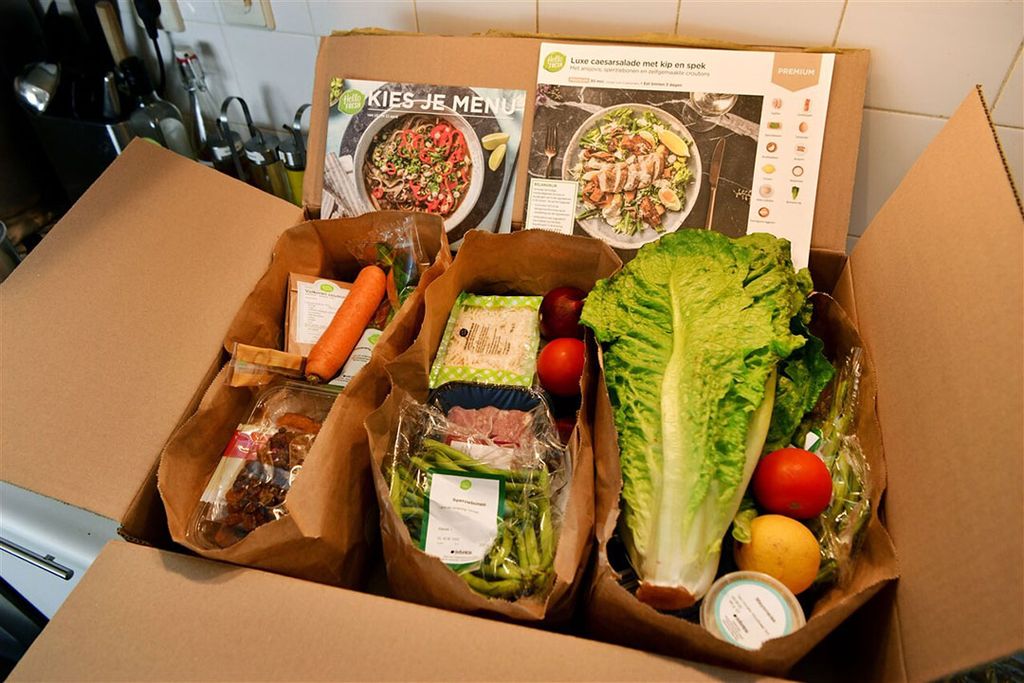 Een bezorgde HelloFresh-maaltijdendoos met recepten. Foto: ANP