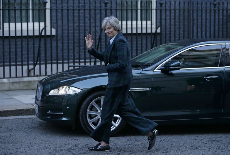 De Britse premier May komt aan bij Downing Street 10 nadat ze haar speech heeft gehouden over het Britse vertrek uit de EU. Foto: ANP