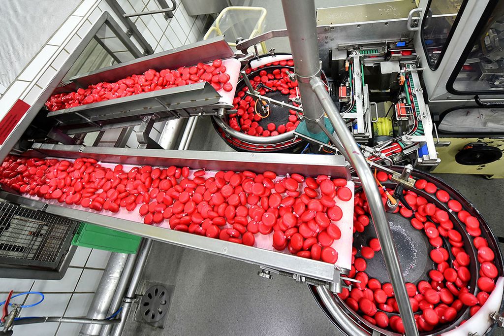 Productie van het kaasje Babybel bij Groupe Bel in Frankrijk. - Foto: AFP